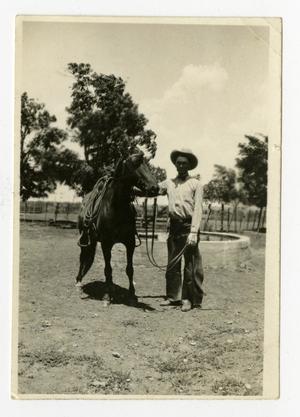 Primary view of object titled '[Eli Pruitt with a Horse]'.