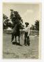 Primary view of [Eli Pruitt with a Horse]