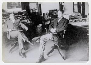 [Two Men Sitting in a Study]