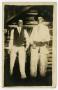 Photograph: [Postcard of Two Men Dressed in Cowboy Attire]
