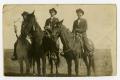 Postcard: [Three Young Men on Horseback]
