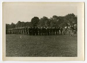 Primary view of object titled '[Photograph of Soldiers and Band Marching]'.
