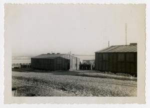 Primary view of object titled '[Photograph of Soldiers and Buildings]'.