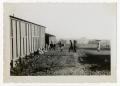 Photograph: [Photograph of Soldiers and Buildings]