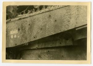[Photograph of Bullet Holes]