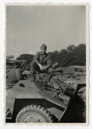[Photograph of Soldier on Armored Car]