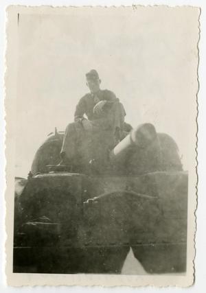 [Photograph of Lester Johnson on Tank]
