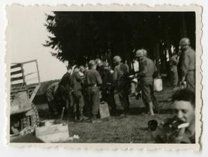 Primary view of object titled '[Photograph of Soldiers Eating]'.
