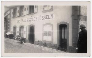 [Photograph of Soldier Outside Beer Hall]