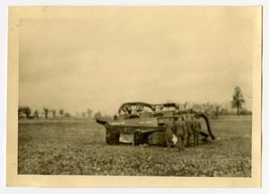 [Photograph of Overturned Tank]