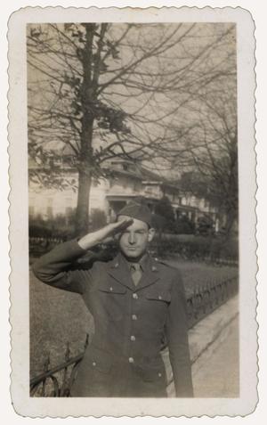 Primary view of object titled '[Photograph of Clarence Whitefield Saluting]'.