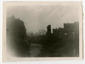 Primary view of object titled '[Photograph of Town in Ruins]'.