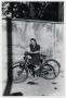 Thumbnail image of item number 1 in: '[Photograph of Young Woman on Bicycle]'.