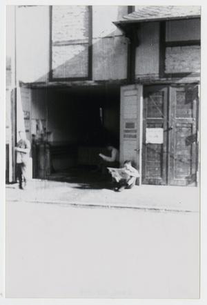 Primary view of object titled '[Photograph of Soldiers in Garage]'.