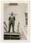 Primary view of [Photograph of Johnny Poulos Outside Barracks]