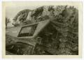 Photograph: [Photograph of Overturned Tank]