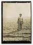 Photograph: [Photograph of Edward Johnson in a Field]