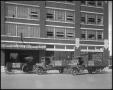 Primary view of [Francisco Villa Tractor and Trucks Parked in Front of Lone Star Motor Company]