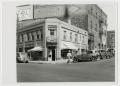 Photograph: [Business Buildings on a Street Corner]