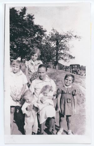 Primary view of object titled '[Elderly Woman with Five Children]'.