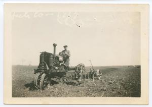 Primary view of object titled '[Jim Myers on a Tractor]'.