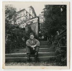 [Photograph of Soldier on Stairs]