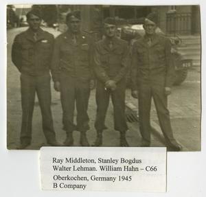 [Four Soldiers Standing in Street]