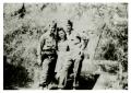 Photograph: [Photograph of Soldiers and Girl]