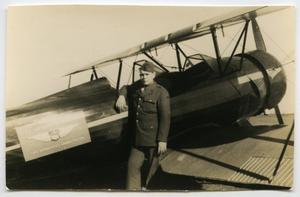 Primary view of object titled '[Photograph of Soldier and Biplane]'.