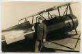 Thumbnail image of item number 1 in: '[Photograph of Soldier and Biplane]'.