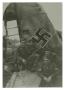 Photograph: [Photograph of Soldiers and Nazi Airplane]