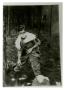 Photograph: [Photograph of Soldier Shaving in Woods]