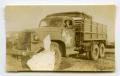Thumbnail image of item number 1 in: '[Photograph of Soldier in Truck]'.