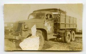 [Photograph of Soldier in Truck]