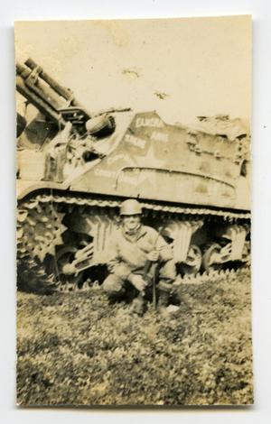 [Photograph of Soldier with Tank]