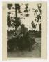 Photograph: [Photograph of Soldier on Motorcycle]