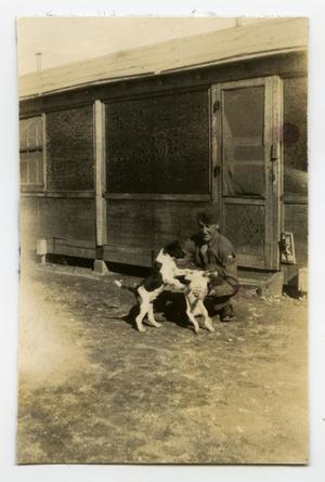 [Photograph of Soldier and Dogs]
