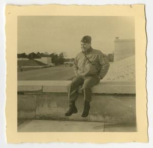 Primary view of [Photograph of Soldier on Wall]