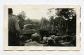 Photograph: [Photograph of Soldiers and Man on Tank]