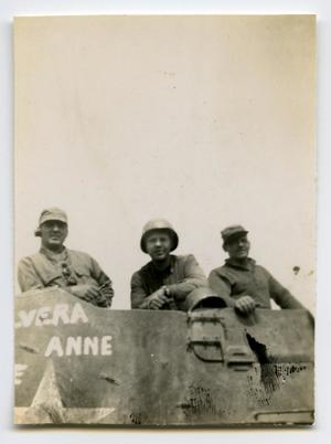 [Photograph of Soldiers on Tank]