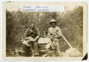 [Photograph of John Paulos and Clarence Oxford]