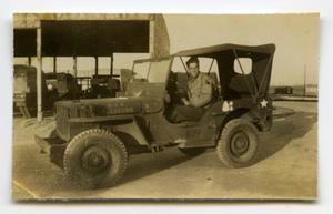 [Photograph of Soldier in Jeep]