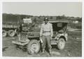 Photograph: [Photograph of Soldier and Jeep]