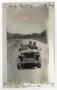 Photograph: [Three Men in Jeep at Camp Barkeley]