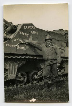 [Photograph of Soldier and Tank]