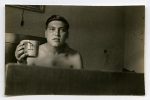 [Photograph of Soldier Drinking Coffee]