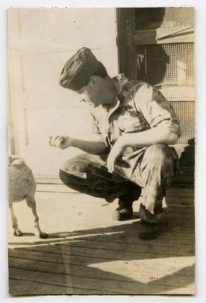 [Photograph of Soldier and Dog]
