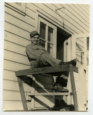 [Photograph of Soldier on Barracks Porch]