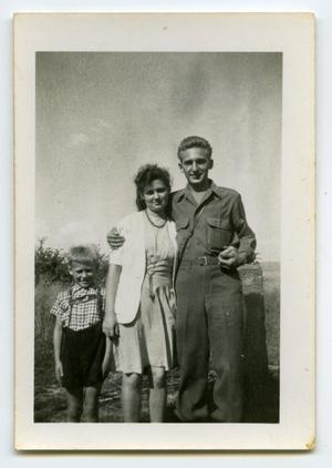 [Photograph of Soldier and Family]