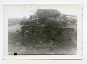 [Photograph of Destroyed Tank]